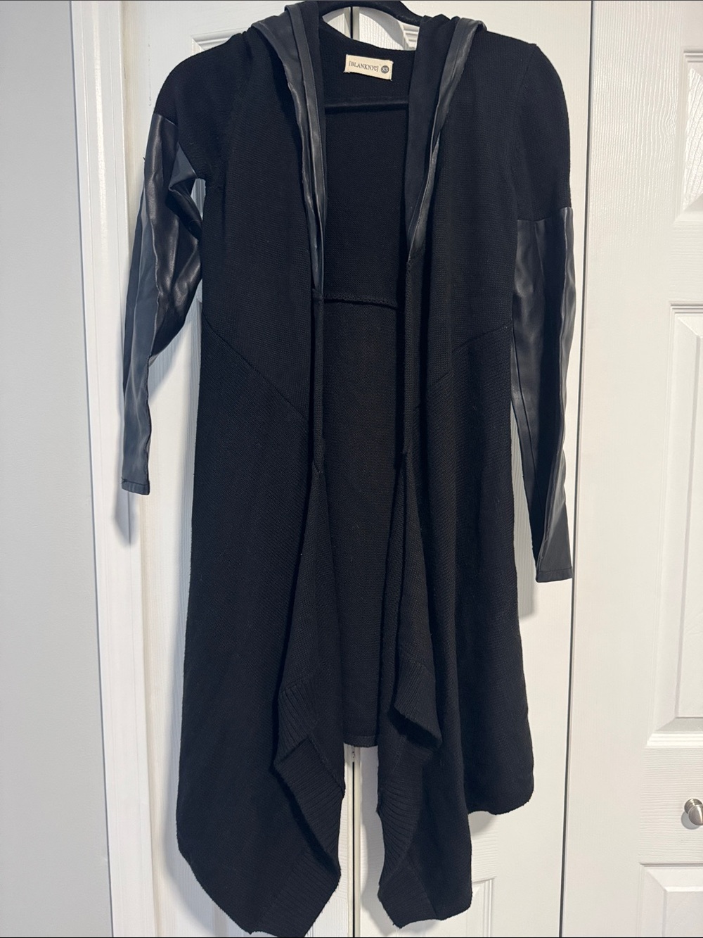 BLANKNYC Black Hooded Drape Cardigan with Faux Leather Sleeve Panels and hoodie